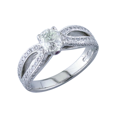Oval shaped diamond single stone ring with pave set diamond shoulders