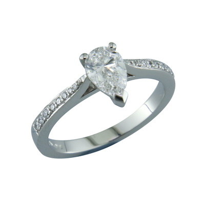 Pear shaped diamond ring with pave set shoulders