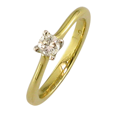 Yellow gold single stone ring with a brilliant cut diamond