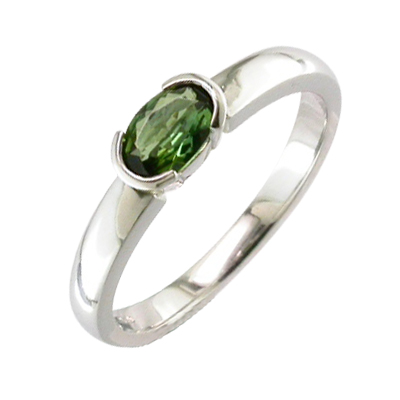 Oval shaped Tsavorite platinum ring