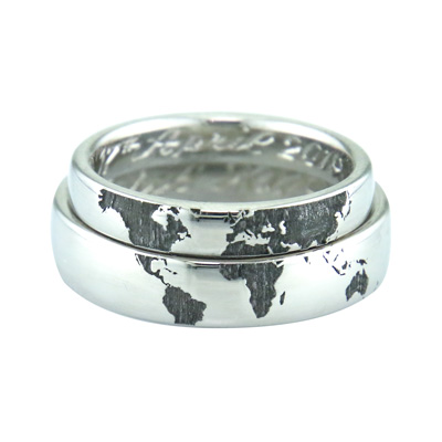Ladies and gent’s bands, with world style engraving, made for a couple that met traveling