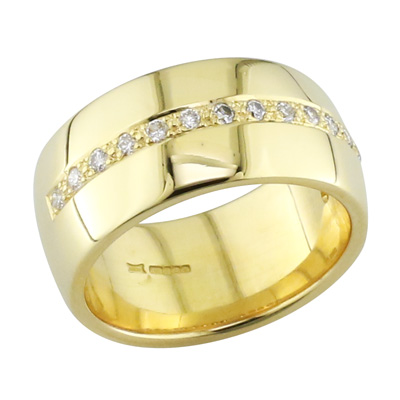 Gent’s gold wide band with grain set diamonds in the centre