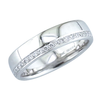 Gent’s platinum band with grain set diamonds