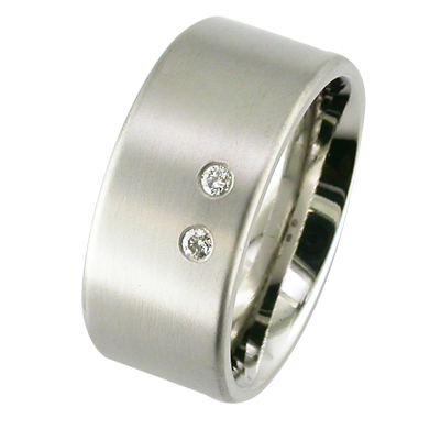 Gent’s platinum wedding ring with flush set diamond and a matt finish