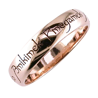 Gents rose gold wedding ring with old English engraving