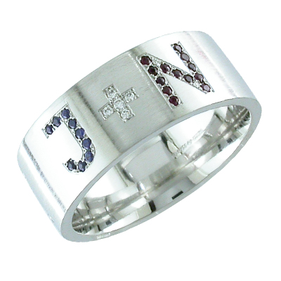 Gent’s platinum band with sapphires and ruby initials