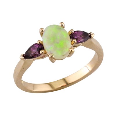 Opal three stone ring with pear shaped Garnets set in rose gold
