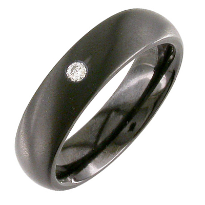 Gent’s zirconium band with flush set diamond