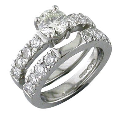 Platinum wedding ring made to match the shoulder stones of engagement ring