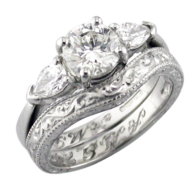 Platinum fitted wedding ring with antique scroll engraving