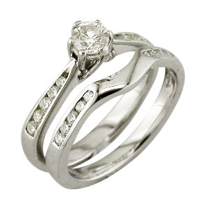 Platinum fitted wedding ring with matching diamond set shoulders