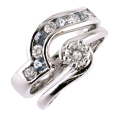 Platinum fitted wedding ring with channel set diamonds and aquamarines