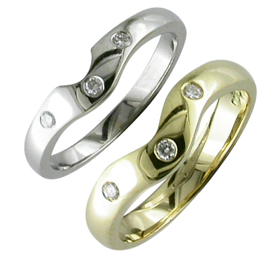 Yellow gold and platinum fitted wedding rings with flush set diamonds