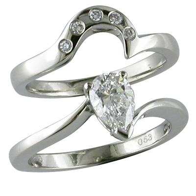 Platinum fitted wedding ring with channel set diamonds