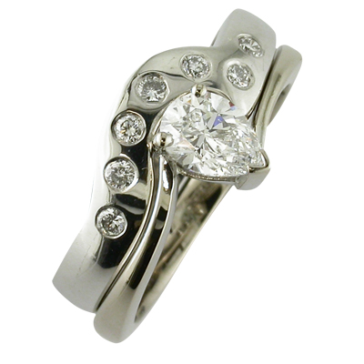 White gold fitted wedding ring with flush set diamonds
